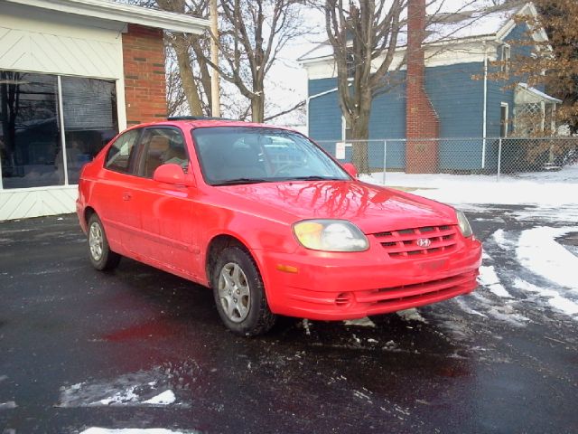 2003 Hyundai Accent 2000 Dodge SLT