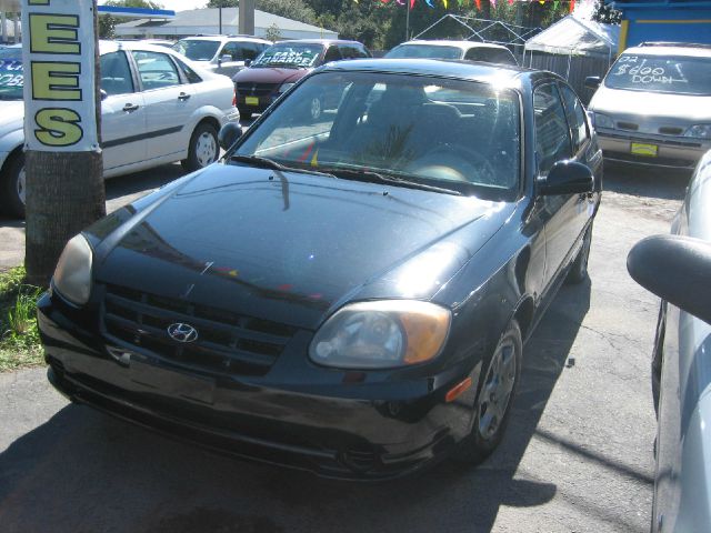 2003 Hyundai Accent 2000 Dodge SLT