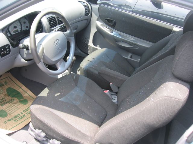 2003 Hyundai Accent 2000 Dodge SLT