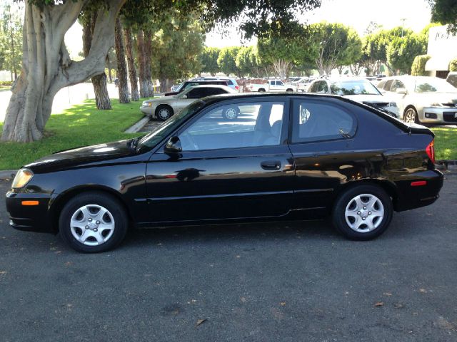 2004 Hyundai Accent 2000 Dodge SLT