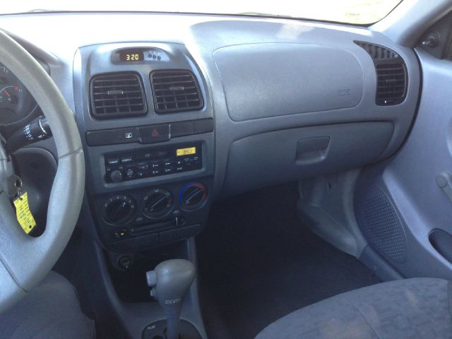 2004 Hyundai Accent 2000 Dodge SLT