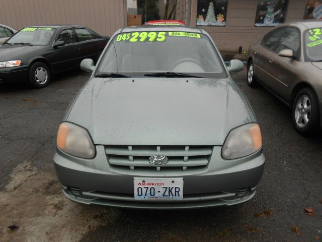2004 Hyundai Accent 2000 Dodge SLT