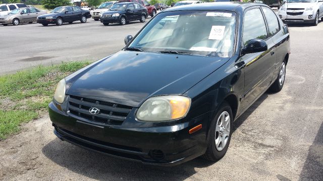 2004 Hyundai Accent 2000 Dodge SLT