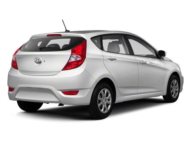2013 Hyundai Accent 2006 Dodge Sport