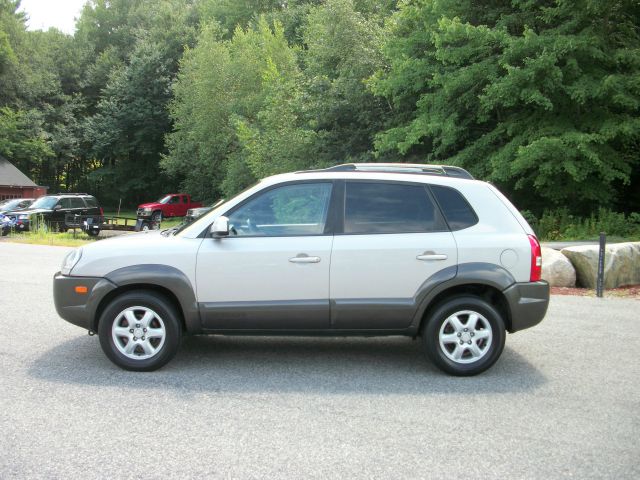 2005 Hyundai Tucson 2002 Saturn