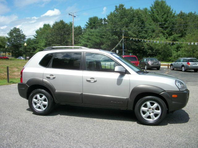 2005 Hyundai Tucson 2002 Saturn