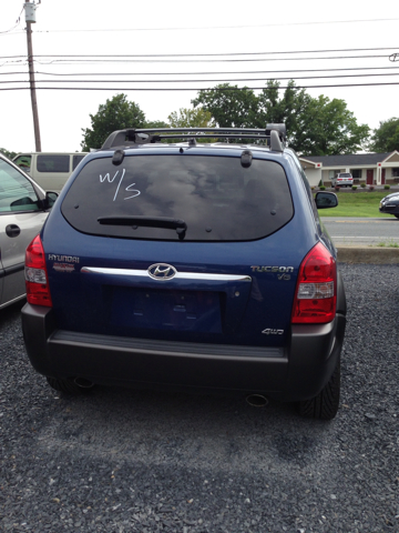2005 Hyundai Tucson 2002 Saturn