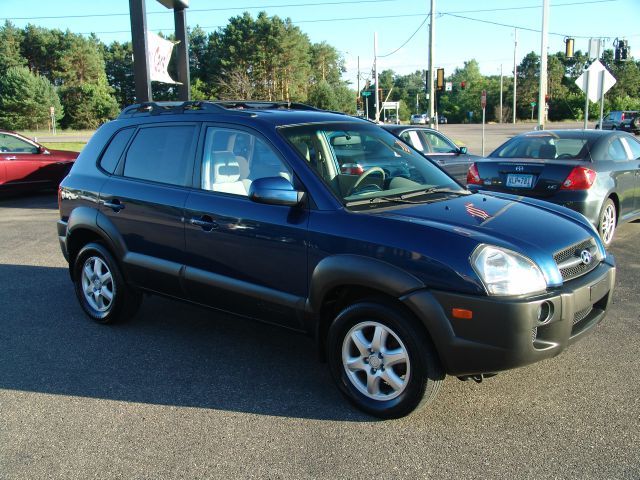 2005 Hyundai Tucson 2002 Saturn