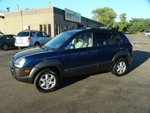 2005 Hyundai Tucson 2002 Saturn