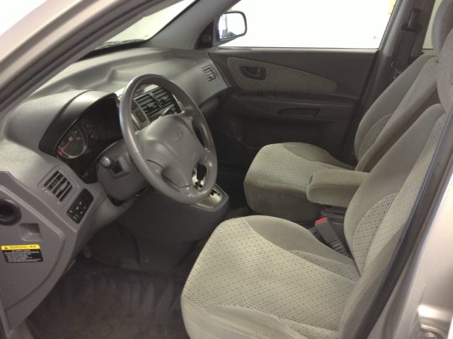 2005 Hyundai Tucson 2002 Saturn