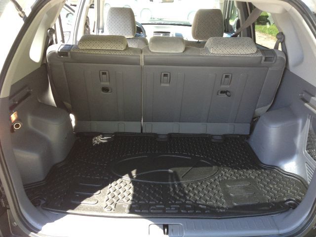 2005 Hyundai Tucson 2002 Saturn