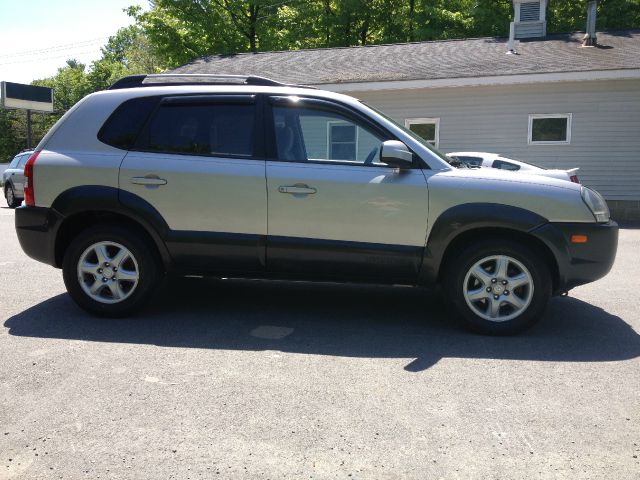 2005 Hyundai Tucson 2002 Saturn