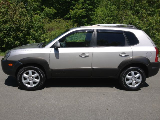 2005 Hyundai Tucson 2002 Saturn