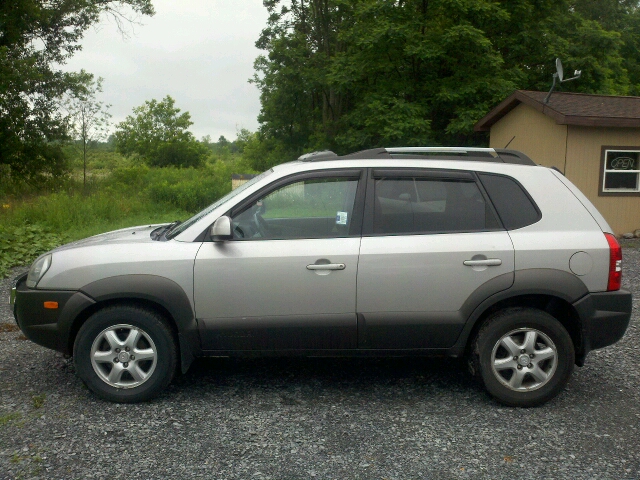 2005 Hyundai Tucson 2002 Saturn