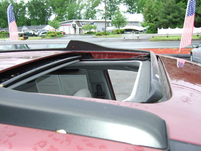 2005 Hyundai Tucson 2002 Saturn