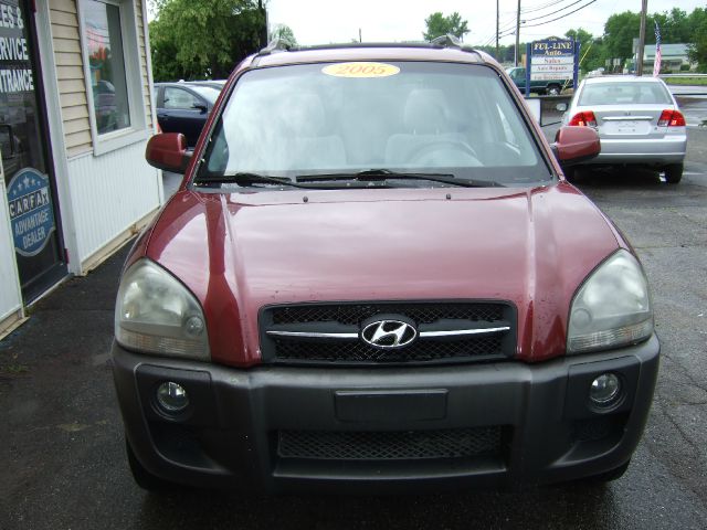 2005 Hyundai Tucson 2002 Saturn