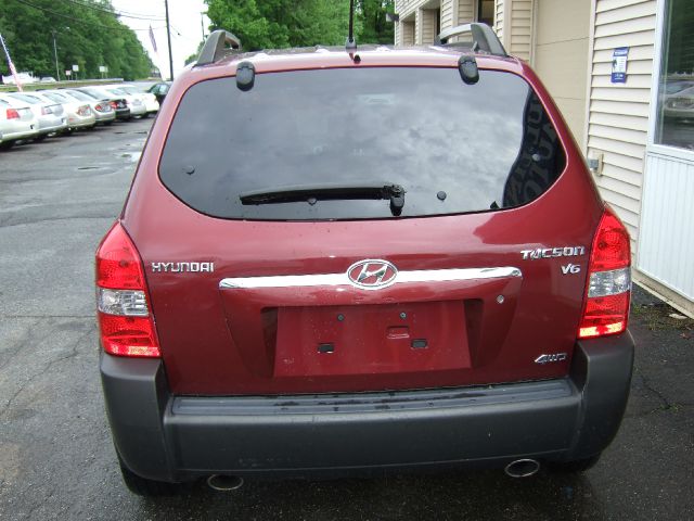 2005 Hyundai Tucson 2002 Saturn