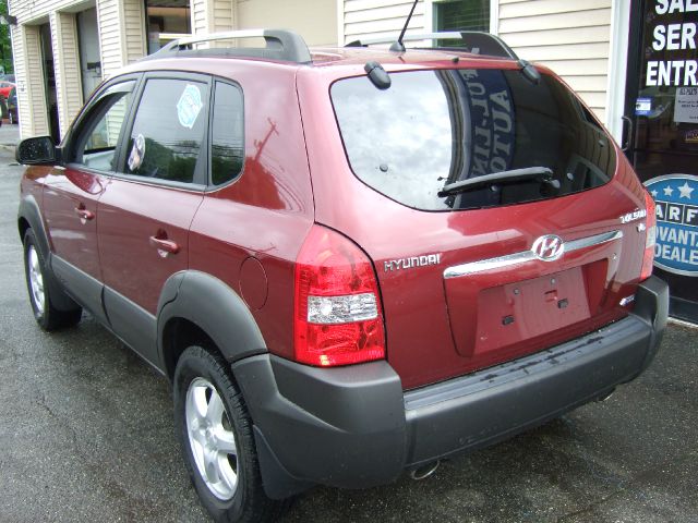 2005 Hyundai Tucson 2002 Saturn