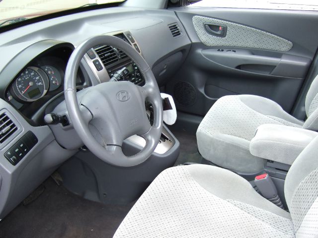 2005 Hyundai Tucson 2002 Saturn