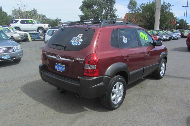 2005 Hyundai Tucson 2002 Saturn