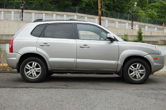 2006 Hyundai Tucson 2002 Saturn