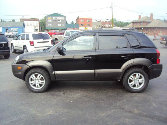 2006 Hyundai Tucson 2002 Saturn