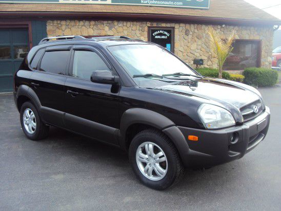 2006 Hyundai Tucson 2002 Saturn
