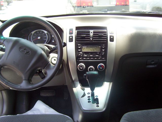 2006 Hyundai Tucson 2002 Saturn