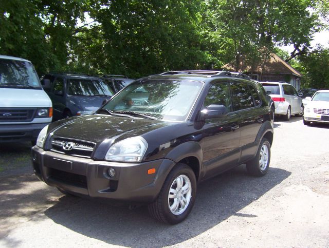 2006 Hyundai Tucson 2002 Saturn