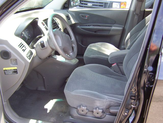 2006 Hyundai Tucson 2002 Saturn