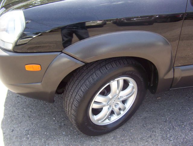 2006 Hyundai Tucson 2002 Saturn