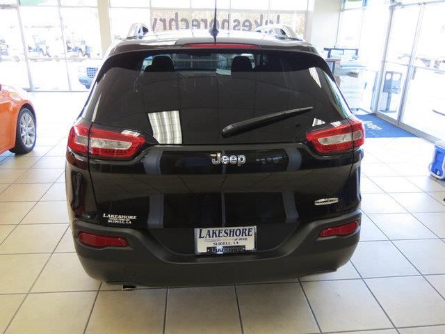 2014 Jeep Liberty 1995 Lincoln Signature