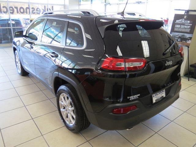 2014 Jeep Liberty 1995 Lincoln Signature