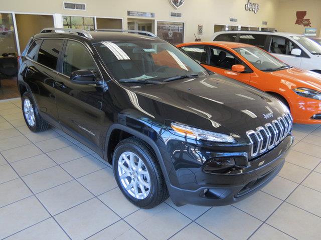 2014 Jeep Liberty 1995 Lincoln Signature