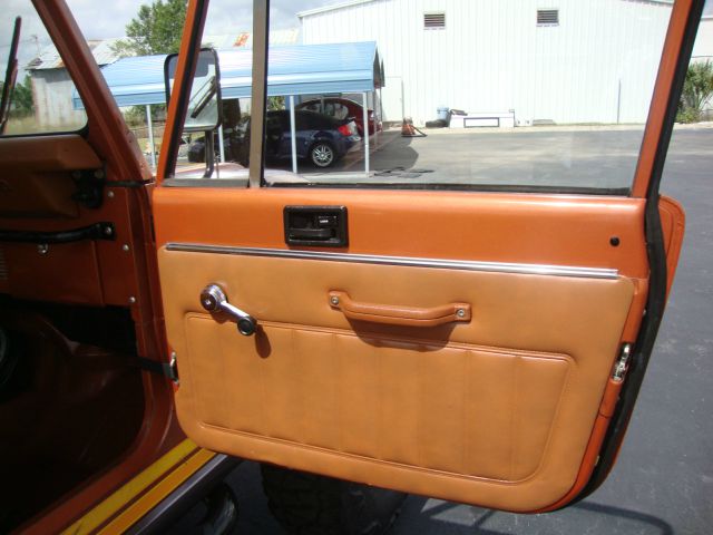 1981 Jeep Scrambler CJ8 2010 Cadillac CTS