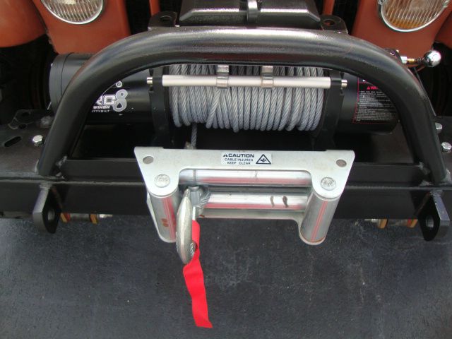 1981 Jeep Scrambler CJ8 2010 Cadillac CTS