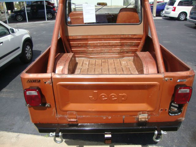 1981 Jeep Scrambler CJ8 2010 Cadillac CTS