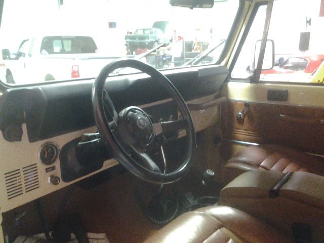 1983 Jeep Scrambler CJ8 2010 Cadillac CTS