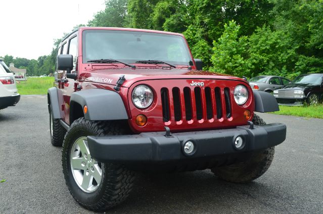 2011 Jeep Wrangler Unlimited X-cab Sport