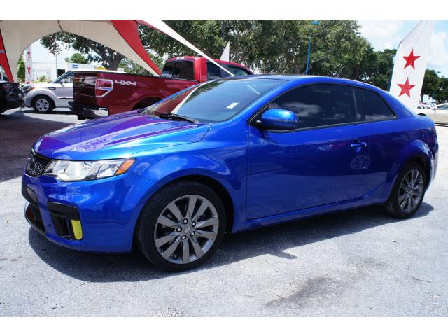 2011 Kia Forte Koup AWD, REAR DVD, Navigation, 3RD ROW, Mem/heat Seats