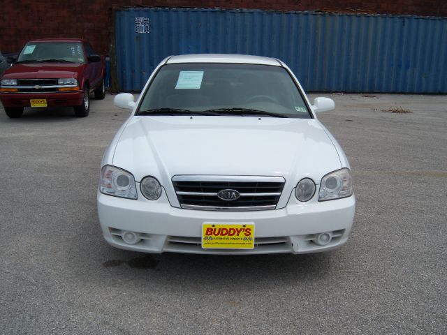 2006 Kia Optima 1998 Jaguar 8