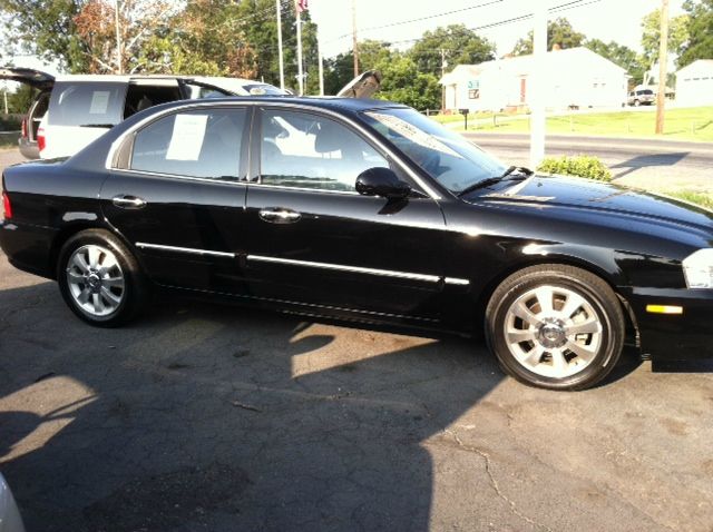 2006 Kia Optima 1998 Jaguar 8