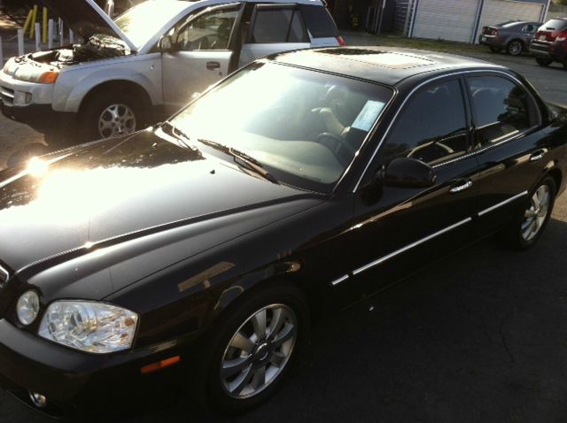 2006 Kia Optima 1998 Jaguar 8