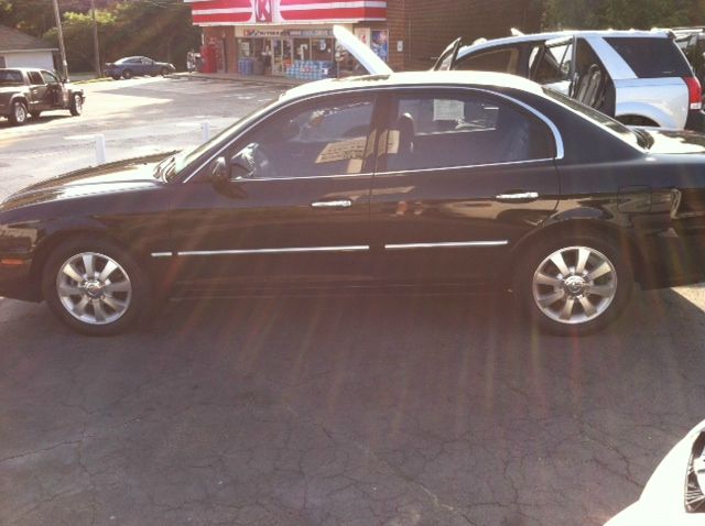 2006 Kia Optima 1998 Jaguar 8