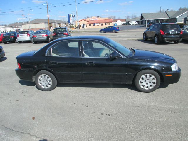 2006 Kia Optima 1998 Jaguar 8