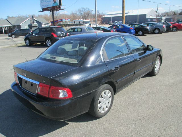 2006 Kia Optima 1998 Jaguar 8