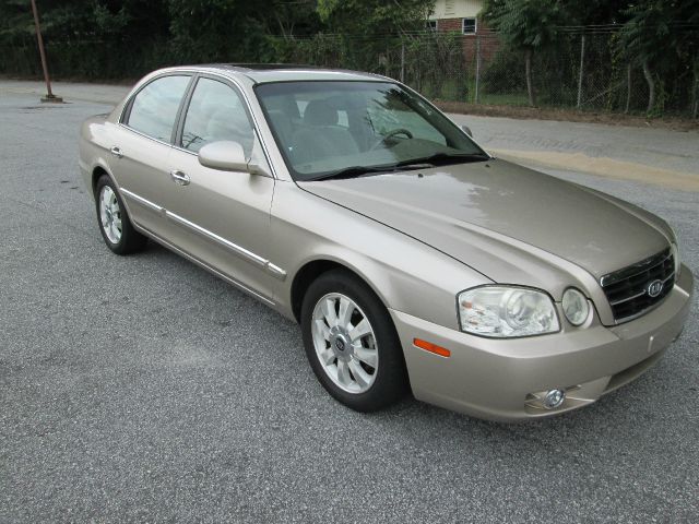 2006 Kia Optima 1998 Jaguar 8
