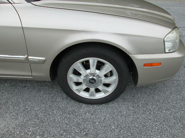 2006 Kia Optima 1998 Jaguar 8