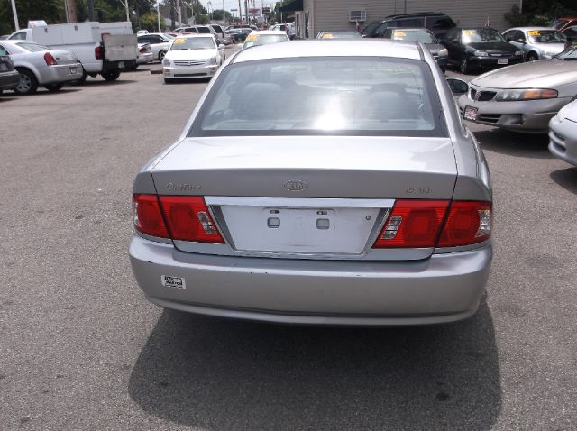 2006 Kia Optima 1998 Jaguar 8