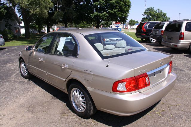 2006 Kia Optima 1998 Jaguar 8